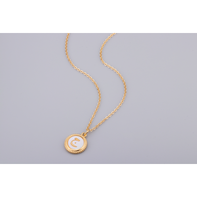 Golden pendant with insertion of a pearly shell medallion decorated with the letter "Djim" ج